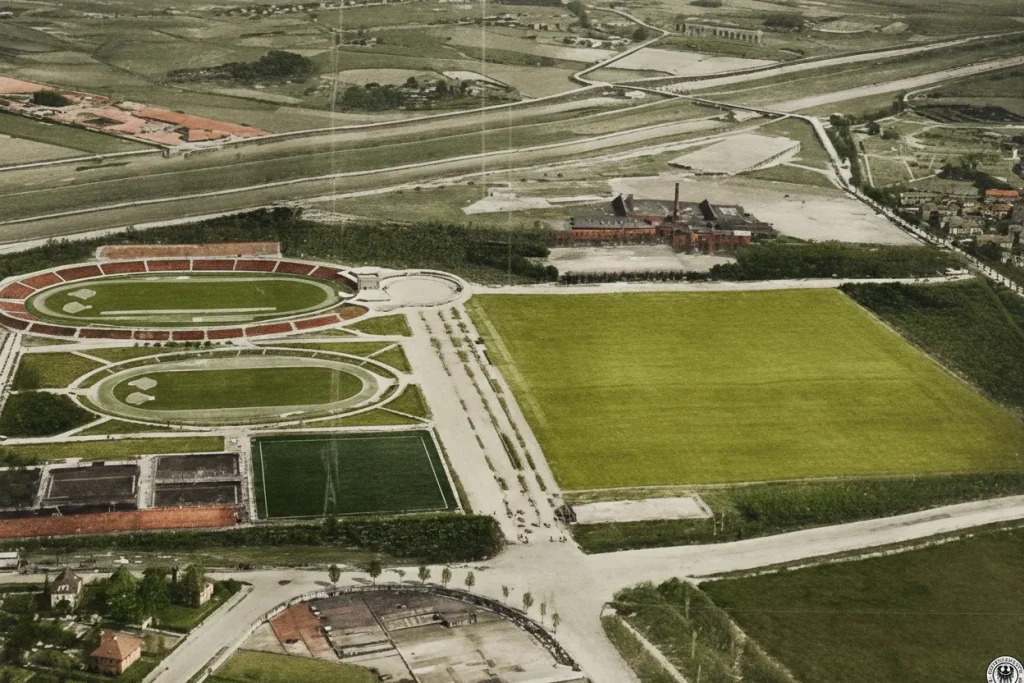 Archiwalne zdjęcie z lotu ptaka przedstawiające Stadion Olimpijski we Wrocławiu w 1927 roku z widocznymi torami lekkoatletycznymi i boiskami.